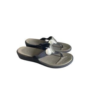 Crocs Women’s 9 Sanrah Navy Wedge Sandals Featuring Silver Hammered Medallions